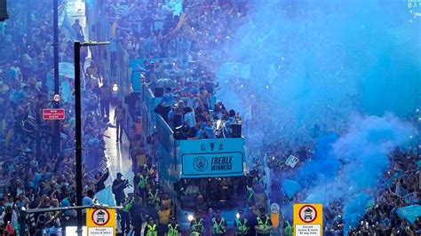 Manchester City: Thousands of fans watch team celebrate Treble with bus parade | UK News | Sky News