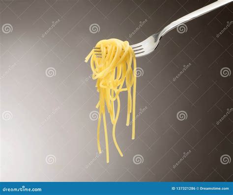 Spaghetti on a fork stock photo. Image of gray, snak - 137321286