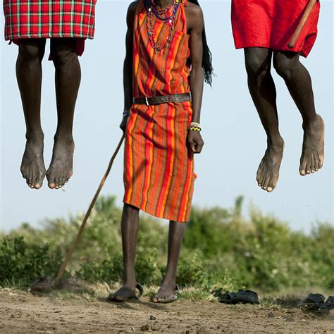 Maasai tribe men jumping during a ceremony, Rift Valley Province ...