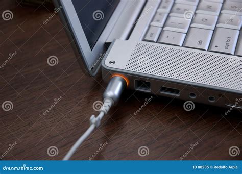 Laptop charging stock image. Image of computer, cable, charging - 88235