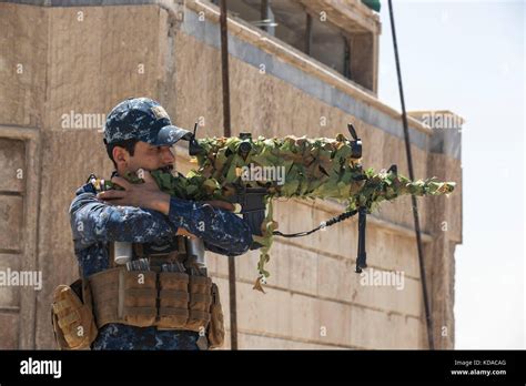 Police sniper guard on roof hi-res stock photography and images - Alamy