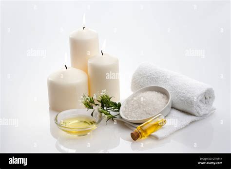 Aromatherapy oil and candles Stock Photo - Alamy