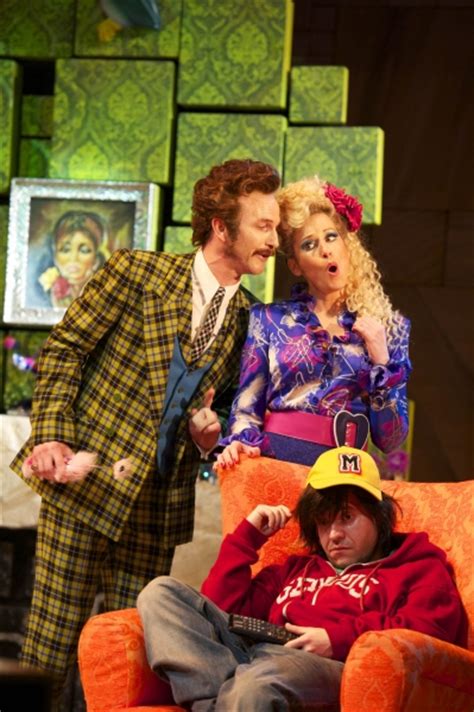 Paul Kaye as Mr. Wormwood, Josie Walker as Mrs. Wormwood and Peter Howe ...