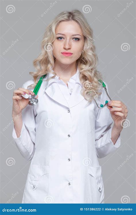 Portrait of a Beautiful Female Doctor Standing with Stethoscope Stock Photo - Image of looking ...