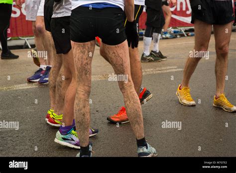 Marathon runner legs Stock Photo - Alamy