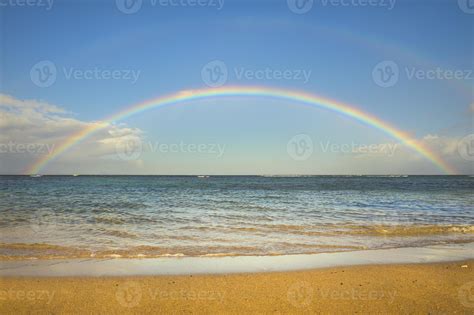 Double rainbow over the ocean by the beach 1354756 Stock Photo at Vecteezy