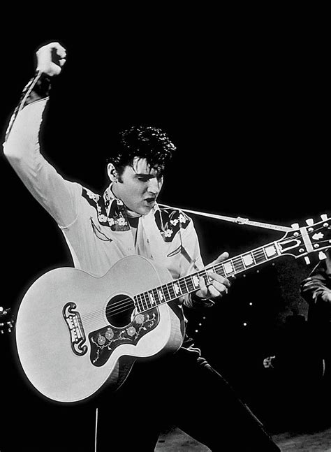 Elvis Presley Playing Guitar On Stage Photograph by Globe Photos - Pixels