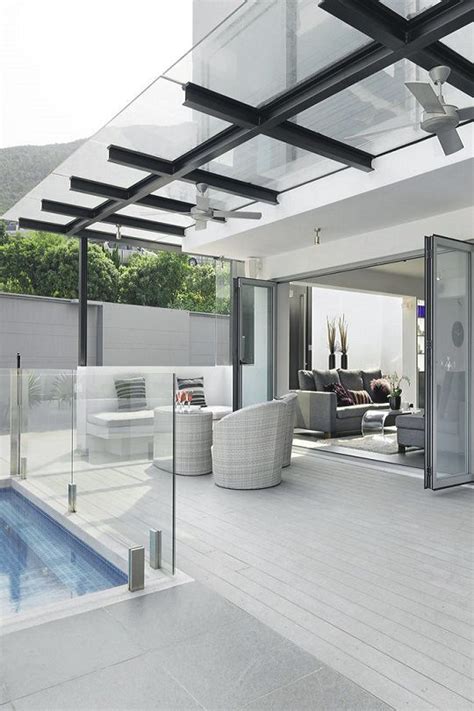 Architectural Designs Awesome! Pool off deck has glass enclosure. Note: Glass canopy ...