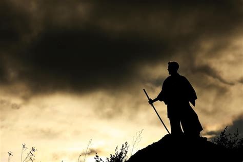 Premium Photo | Fighter with a sword silhouette a sky ninja