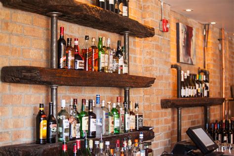 Related image | Rustic bar, Restaurant furniture, Wall mounted shelves