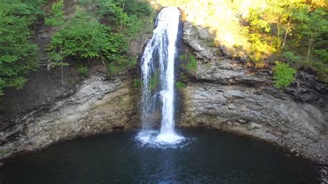 CLOSE UP AERIAL VIEW OF WATERFALL - YouTube