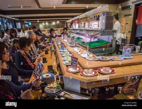 Moving sushi restaurant hi-res stock photography and images - Alamy