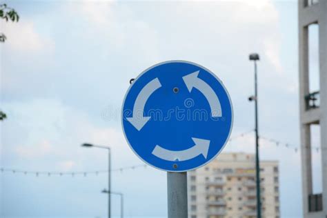 Traffic sign: `Roundabout` stock image. Image of quality - 230156299