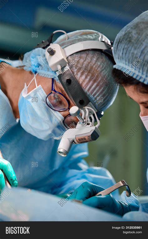 Surgeon His Assistant Image & Photo (Free Trial) | Bigstock