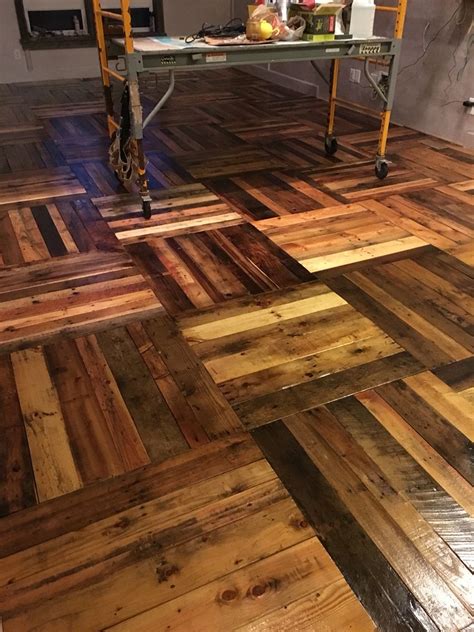 We did it! Pallet wood parquet!!! Swoon | Diy wood floors, Diy flooring, Wood pallet flooring