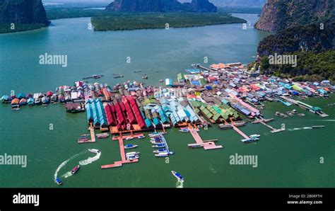 Aerial panorama view over Ko Panyi floating village in souther of Thailand. Ko Panyi is a ...