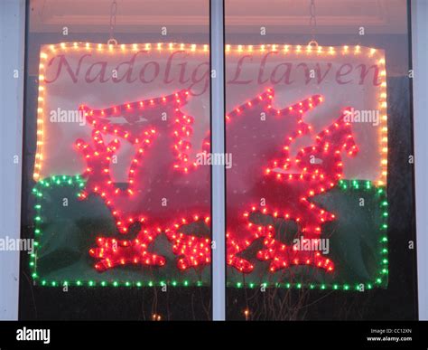 welsh dragon christmas lights in house window in wales great britain uk Stock Photo - Alamy