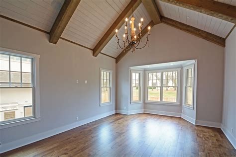 Check out that shiplap, vaulted ceiling! www.yourmagnoliahome.com #vaultedceilingdecor Check ...