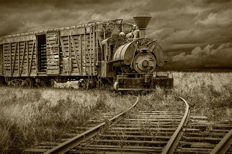 Old Steam Locomotive Train Engine in Sepia Tone Photograph by Randall Nyhof