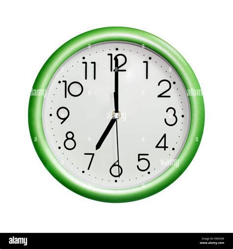 seven o'clock, photo circle green wall clock, on white background ...