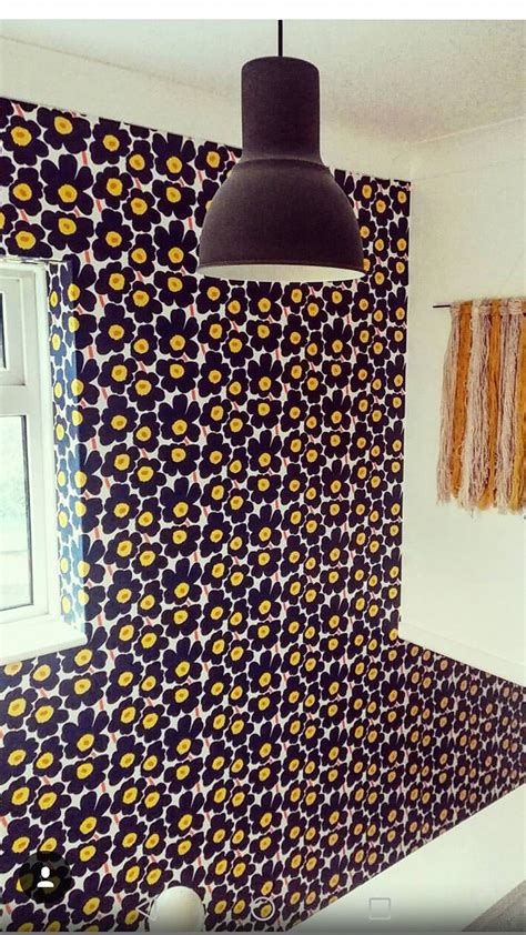 Marimekko wallpaper. Wallpapers direct. Hexagon mirror. Homesense mirror. Hallway. Wool hanging ...