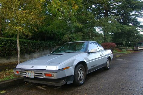 OLD PARKED CARS.: 1986 Subaru XT Turbo.