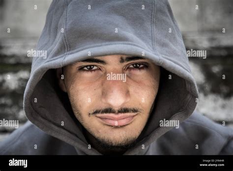 Young man wearing hoodie hi-res stock photography and images - Alamy
