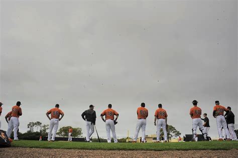 Orioles spring training Orioles players warm up during spring training at the Ed Smith Stadium ...