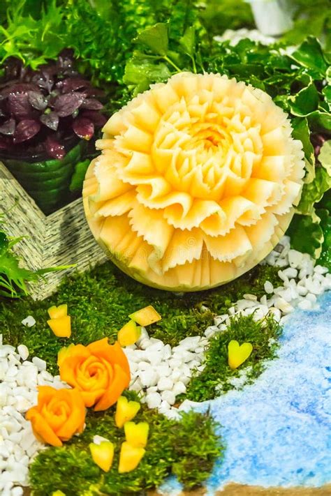 Cantaloupe Fruit Carving in the Garden. on Table Sets. Stock Photo ...