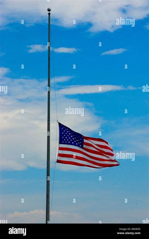 American flag flying at half staff Stock Photo - Alamy