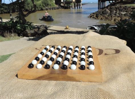 Learn the Hawaiian Strategy Game Kōnane on Kauaʻi - Hawaii Magazine