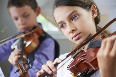 Serious children playing violin - Stock Image - F004/2038 - Science ...