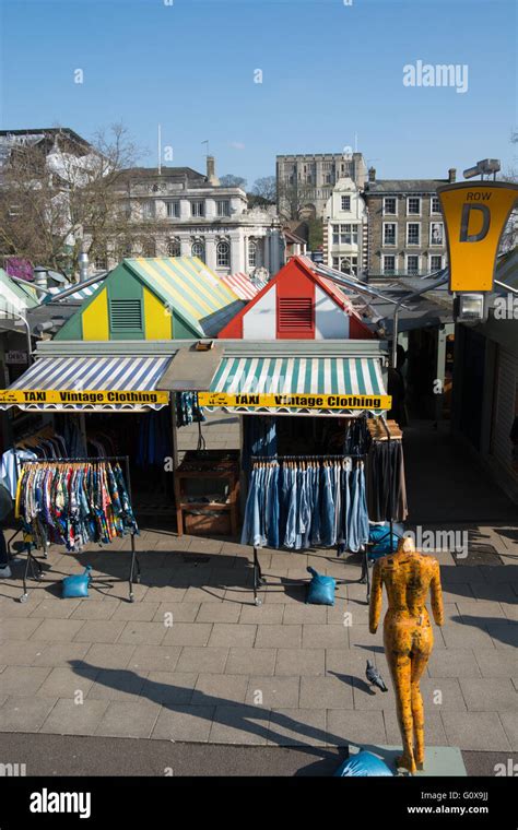 A view across the Norwich market stalls towards Norwich castle on a ...