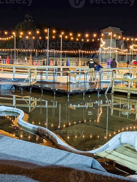 Beautiful outdoor ice rink at night with lights 21447580 Stock Photo at Vecteezy