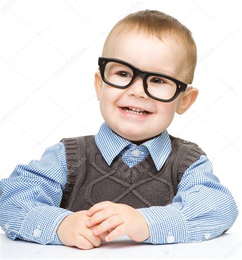 Portrait of a cute little boy wearing glasses — Stock Photo © Kobyakov ...