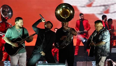 Fuerza Regida band members detained by LAPD after their BMO Stadium ...