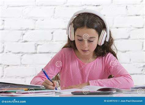 Teen Girl Doing Her Homework with Music Stock Photo - Image of bright, schoolgirl: 62497510