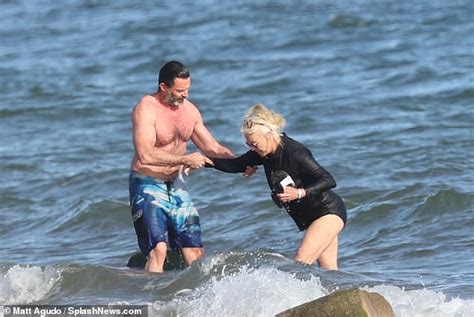 Hugh Jackman and wife Deborra-Lee Furness enjoy a swim during day out ...