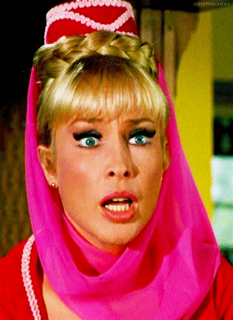 a woman wearing a pink veil and red dress with blue eyes in a scene ...