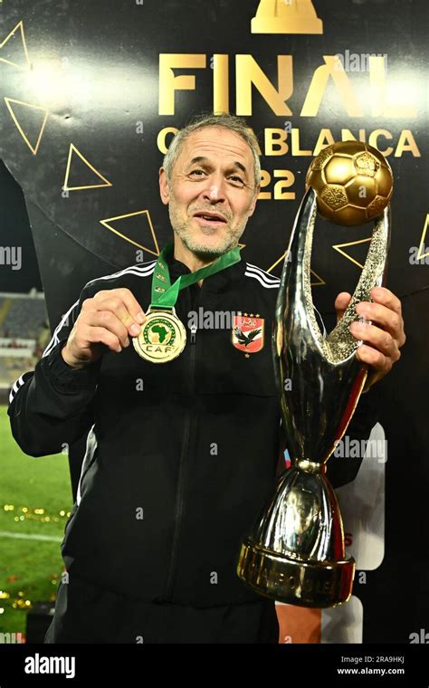 CASABLANCA, MOROCCO - JUNE 11: Marcel Koller Coach of Al Ahly celebrates with the trophy and ...