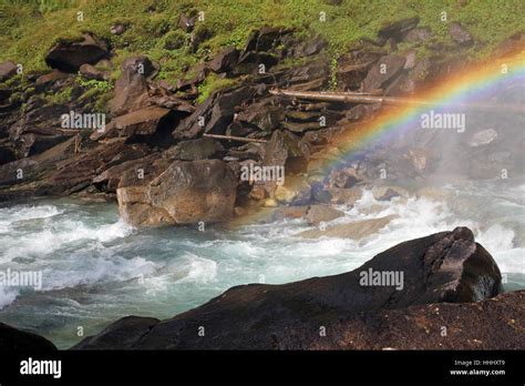 a rainbow over the mountain Stock Photo - Alamy