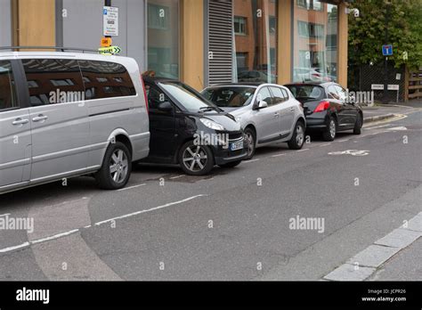 Smart car parked sideways Stock Photo - Alamy