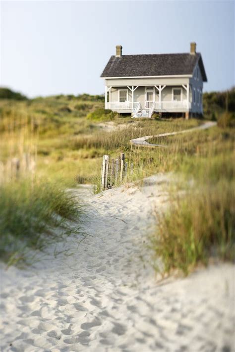 Cottage on Beach stock image. Image of family, oceanfront - 12976535