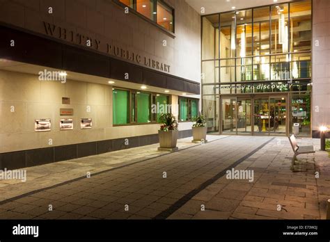 An entrance to the 'Whitby Public Library' including signage in downtown Whitby, Ontario, Canada ...