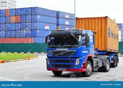 The Port of Singapore Authority (PSA) Manages Busy Cargo Container Traffic at the Port of ...