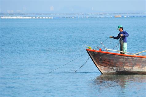 Fisherman In The Sea