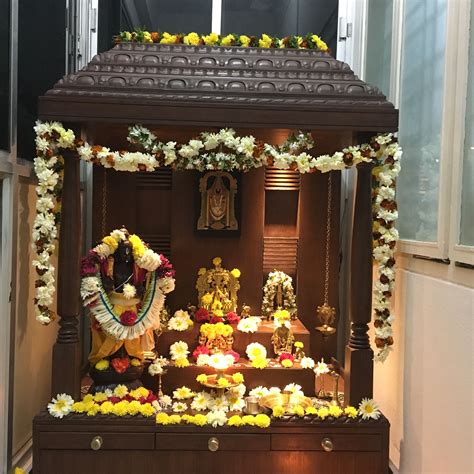 Pin by Penumatsa Neelu on Puja decorations | Pooja room door design ...