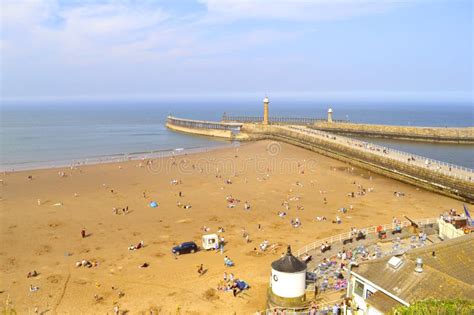 Whitby Beach in North Yorkshire Stock Photo - Image of shore, people ...