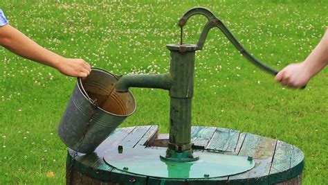 Man Powered Water Pump At The Well Stock Footage Video 4171897 - Shutterstock