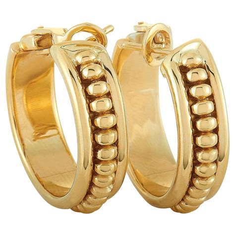 Chaumet 18 Karat Yellow Gold Omega Back Hoop Earrings at 1stDibs